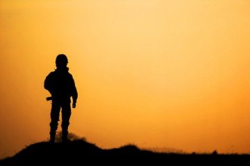 soldier-silhouette-shutterstock_155583794-360×240